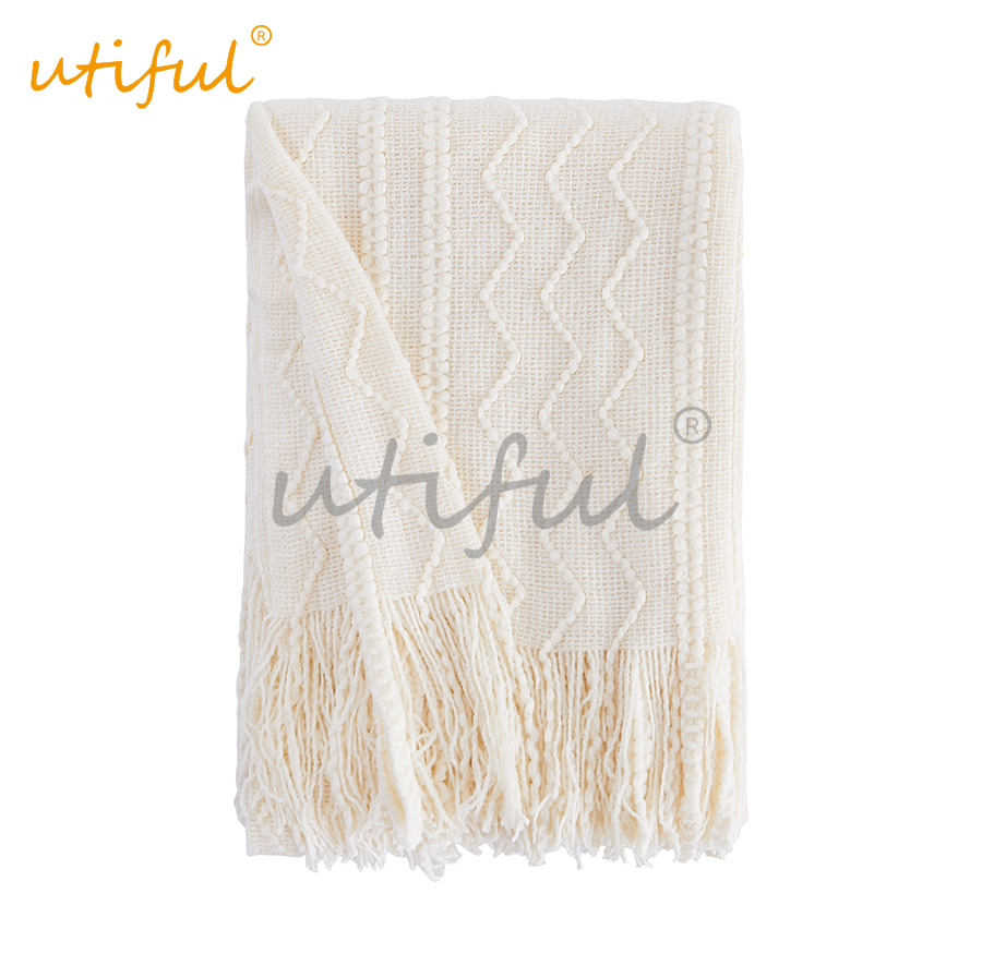 Wave and chain warp knitting tassel throw